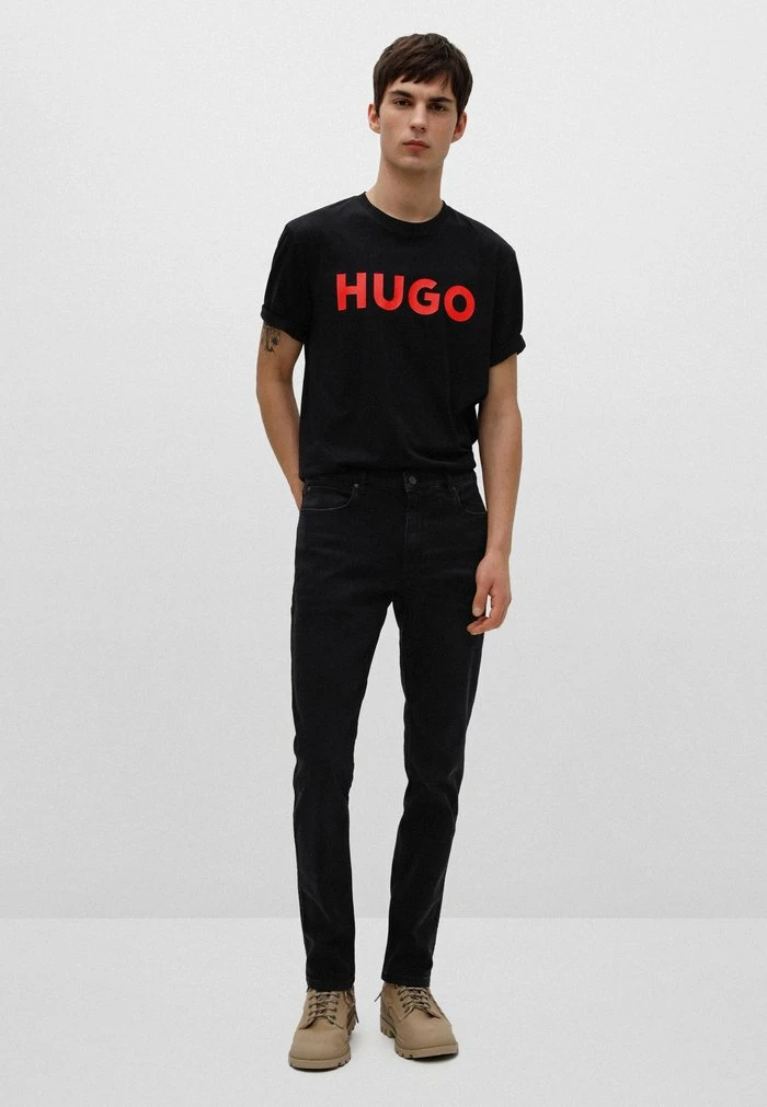 Acheter 👏 HUGO DULIVIO - T-shirt Imprimé - Black 🌟 2 Acheter 👏 HUGO DULIVIO - T-shirt Imprimé - Black 🌟 – Image 2
